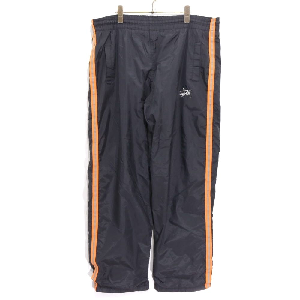STUSSY 90s-00s | "Red & Blue Tag" Nylon Track Pants "Black / Orange