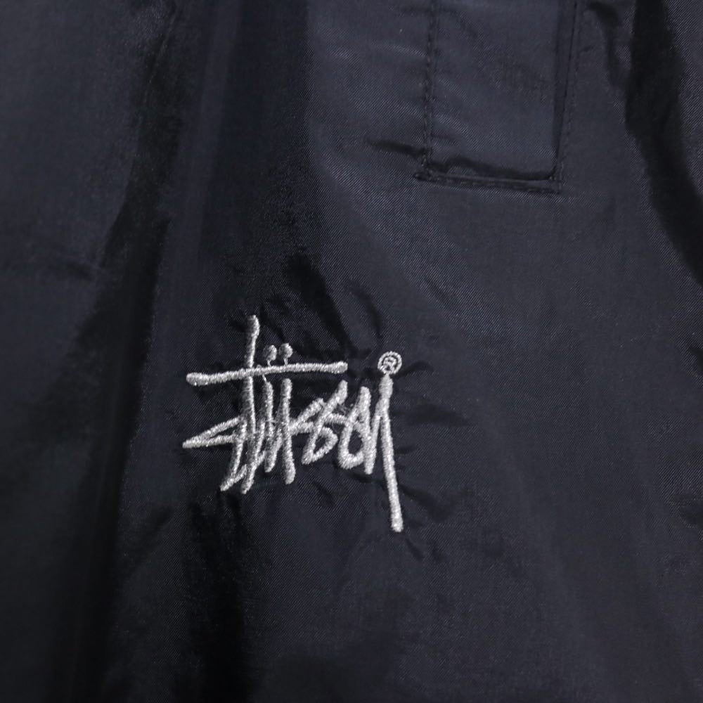STUSSY 90s-00s | "Red & Blue Tag" Nylon Track Pants "Black / Orange