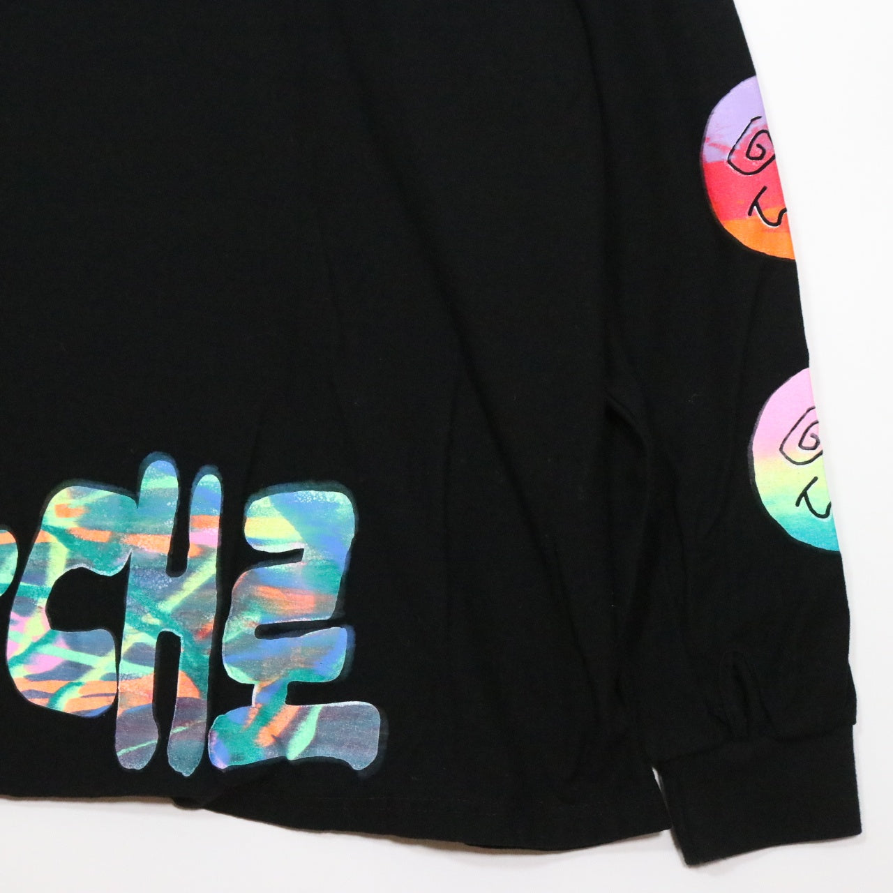 99%IS(ナインティナインパーセントイズ) "SMILEY" Sleeve Logo Long Sleeve T-Shirt