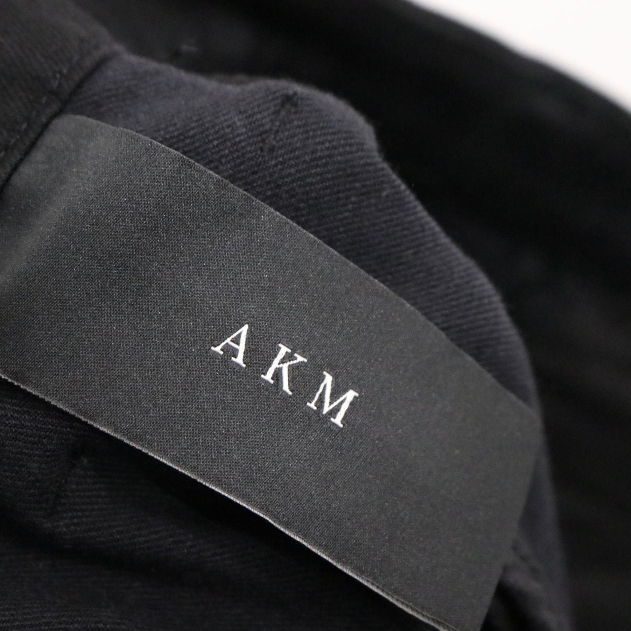 AKM(エーケーエム) DENIM SLACKS