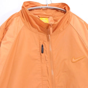 Nike x NOCTA 24SS | Northstar Nylon Track Jacket "Hot Curry / Orange Trance" (FN7666-808)