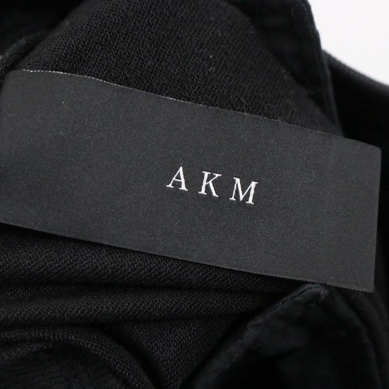AKM(エーケーエム) COMPACT FRENCH TERRY 1POINT AKM LOGO EASY PANTS