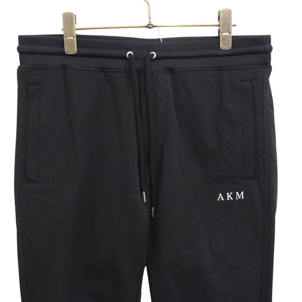 AKM(エーケーエム) COMPACT FRENCH TERRY 1POINT AKM LOGO EASY PANTS