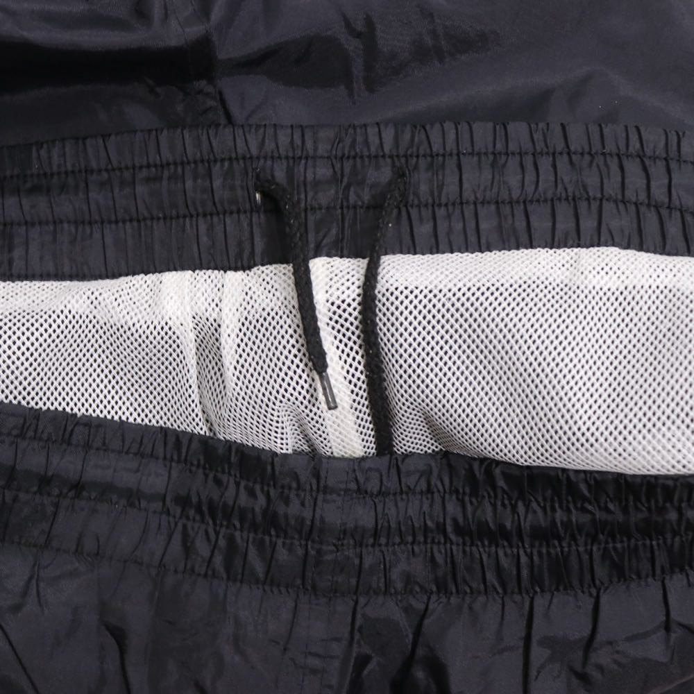 STUSSY 90s-00s | "Red & Blue Tag" Nylon Track Pants "Black / Orange