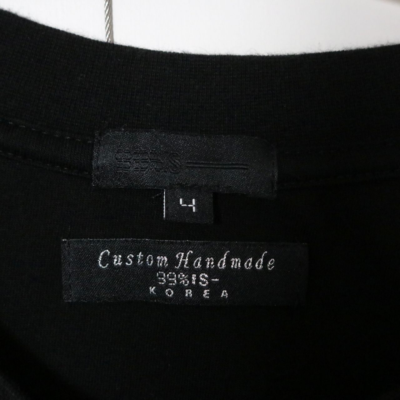 99%IS(ナインティナインパーセントイズ) "SMILEY" Sleeve Logo Long Sleeve T-Shirt